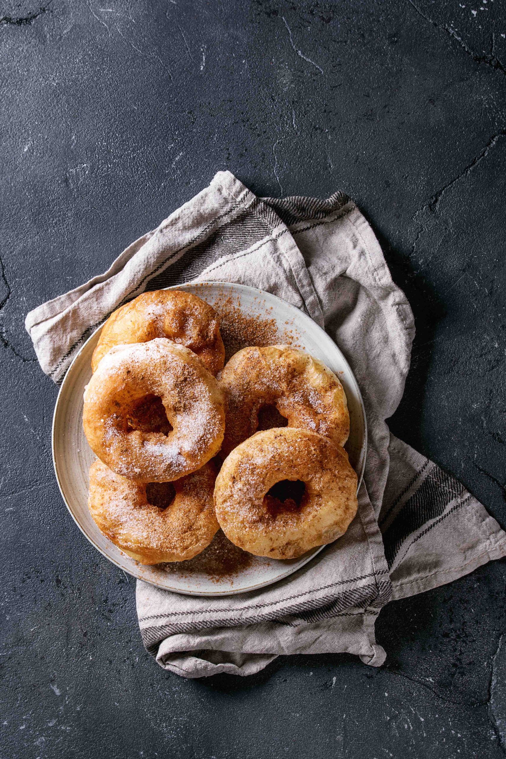 Gluten free vegan pumpkin donuts made with Montana Gluten Free All Purpose Baking Mix