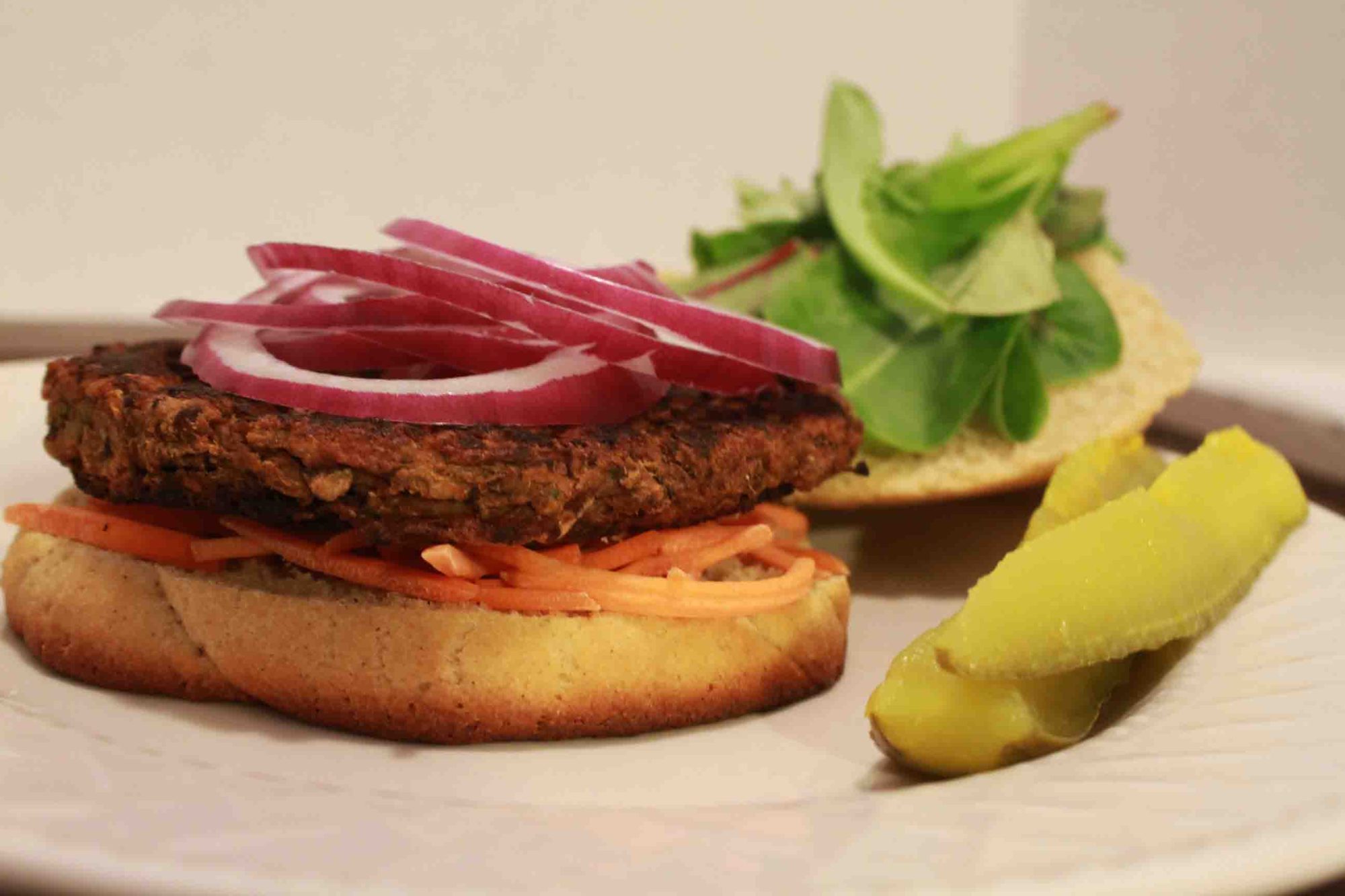 Sideview of hamburger on bun made from Montana Gluten Free flours