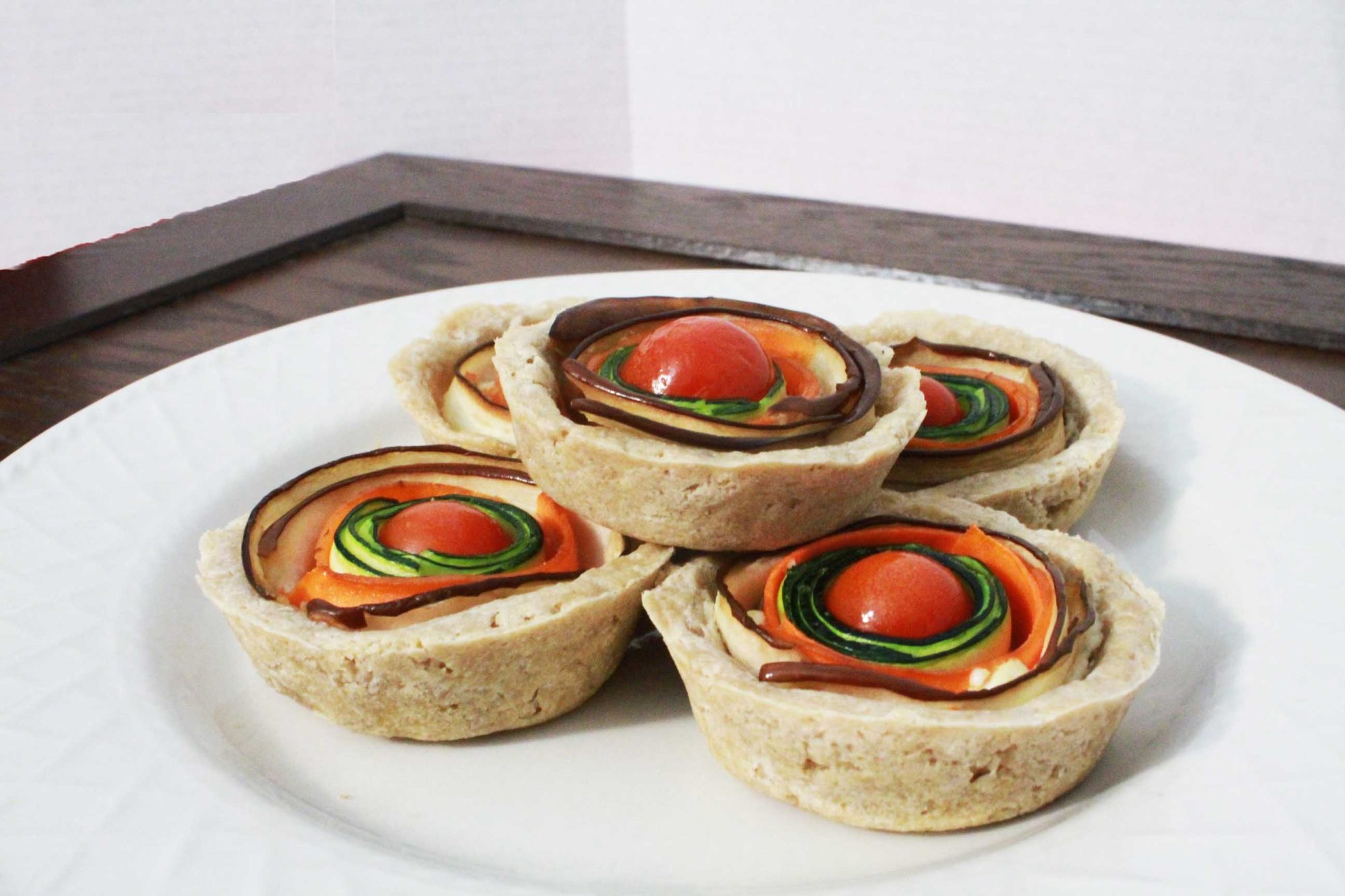 Mini gluten free vegetable swirl tarts made with Montana Gluten Free All Purpose Baking Mix